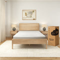 Modern bedroom setup with a queen-size bed and cooling comfort mattress, complete with wooden nightstands and ambient lighting.