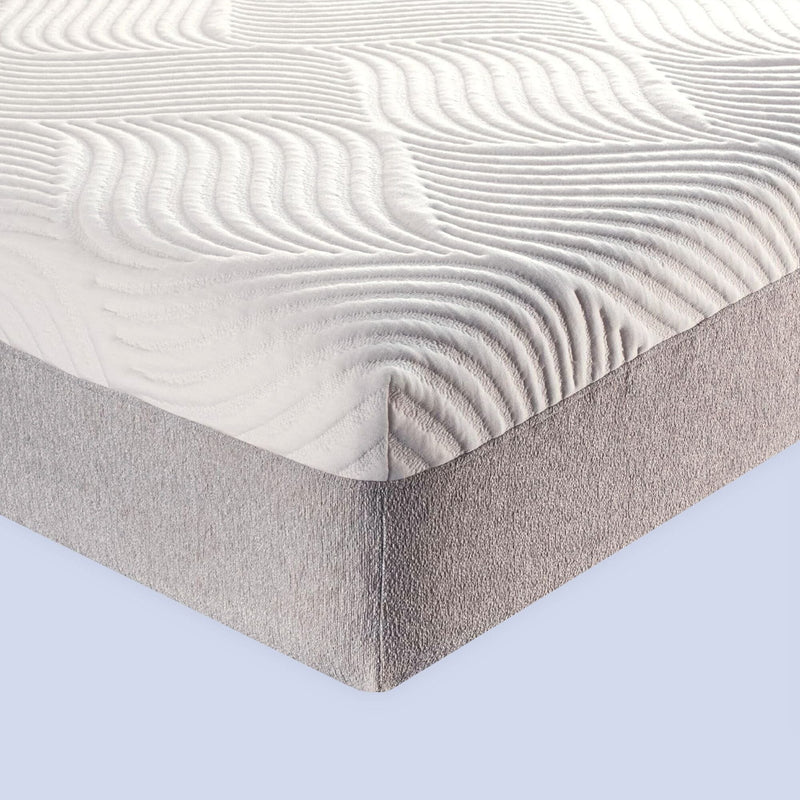 Modern white textured mattress with curved patterns on a grey bed base, ideal for comfort and support.