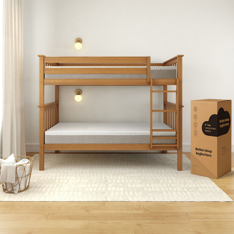 Wooden bunk bed with mattresses, cozy bedroom setup, and packaging box for twin cooling comfort mattress.