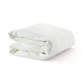 Folded white blanket made from soft, textured fabric ideal for cozy nights or bedroom decor.