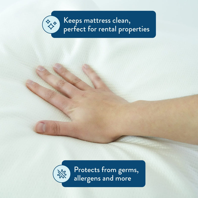 Hand touching a white mattress cover, emphasizing protection against germs, allergens, ideal for rental properties.