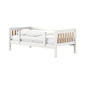 White wooden toddler/twin daybed with safety guardrails, natural wood slats and white bedding