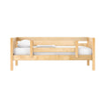 Natural maple solid wood toddler bed with safety guardrail, white mattress and pillow — modern children's daybed for nursery