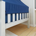 Close-up of white wooden bed frame with blue fitted sheet, slatted side rail and bed leg on hardwood floor