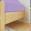 Light natural wood bed frame with lavender fitted sheet on hardwood floor by white baseboard and window — modern minimalist bedroom detail